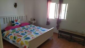 Postel nebo postele na pokoji v ubytování Finca la fortaleza