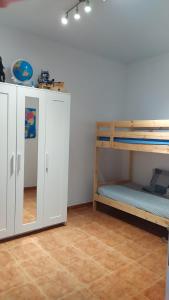 Postel nebo postele na pokoji v ubytování Finca la fortaleza