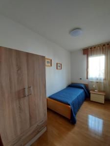 Letto o letti in una camera di un PO sul Delta