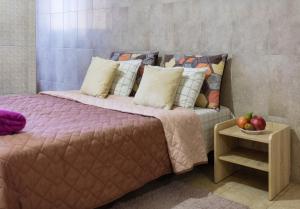 Ένα ή περισσότερα κρεβάτια σε δωμάτιο στο Pechersk House