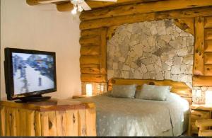 Katil atau katil-katil dalam bilik di Pillmayken Apart&Spa Mar de las Pampas +32 gambar