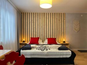 
Łóżko lub łóżka w pokoju w obiekcie Willa Leśna
