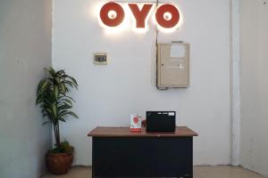 منطقة الاستقبال أو اللوبي في OYO Flagship 1034 Pondok Mulia Guest House Syariah