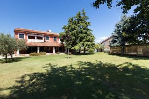 Ein Garten an der Unterkunft Rooms Alla Beccaccia