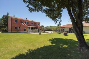 Ein Garten an der Unterkunft Rooms Alla Beccaccia