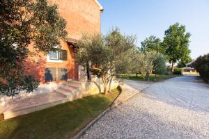 Ein Garten an der Unterkunft Rooms Alla Beccaccia