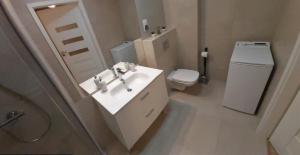 Kúpeľňa v ubytovaní Polanki Park Apartament LEON