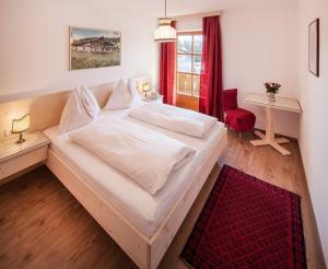 Postel nebo postele na pokoji v ubytování Appartementhaus Zum Schneider