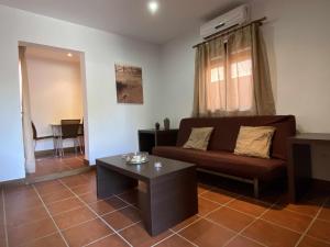 Posedenie v ubytovaní Apartamento con doble entrada y piscina compartida