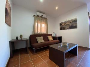 Posedenie v ubytovaní Apartamento con doble entrada y piscina compartida