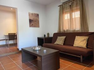 Posedenie v ubytovaní Apartamento con doble entrada y piscina compartida