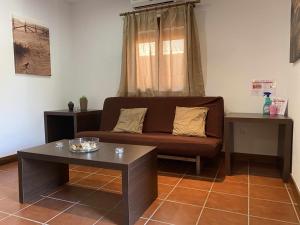 Posedenie v ubytovaní Apartamento con doble entrada y piscina compartida