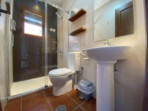Kúpeľňa v ubytovaní Apartamento con doble entrada y piscina compartida