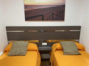 Posedenie v ubytovaní Apartamento con doble entrada y piscina compartida