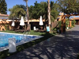 Bazén v ubytovaní Apartamento con doble entrada y piscina compartida alebo v jeho blízkosti