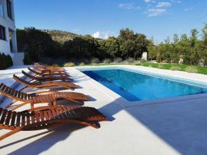 Bazén v ubytování Luxury Villa Reina nebo v jeho okolí