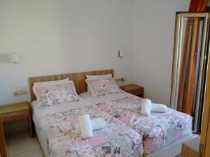 Postel nebo postele na pokoji v ubytování Casa Malena