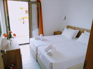 Postel nebo postele na pokoji v ubytování Casa Malena