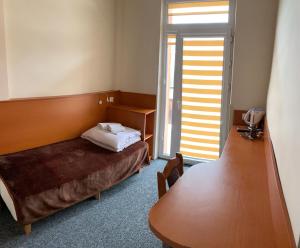 Posteľ alebo postele v izbe v ubytovaní SanatoriumnadKryniczanką