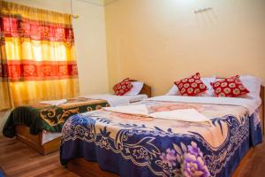 Katil atau katil-katil dalam bilik di Hotel Plaza Nepal
