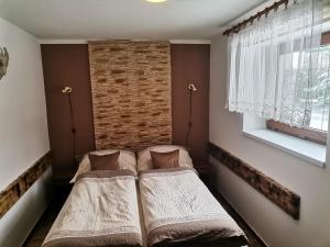 Postel nebo postele na pokoji v ubytování Apartmán Ústie + 37 fotografií