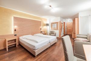 Postel nebo postele na pokoji v ubytování Hotel Foresta