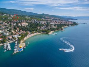 an aerial view of a beach with boats in the water at Apartments Marijana in Crikvenica