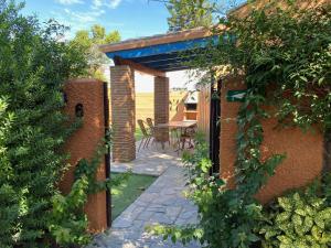 Zahrada ubytování Casita con jardín privado y piscina compartida