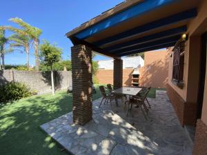 Zahrada ubytování Casita con jardín privado y piscina compartida