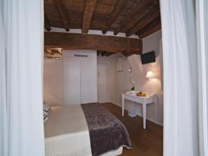 Postel nebo postele na pokoji v ubytování B&B Il Corso