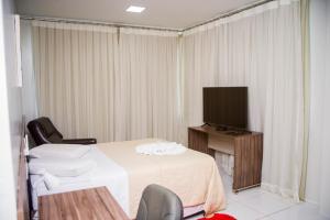 Televizors / izklaižu centrs naktsmītnē Hamara Soft Hotel 2