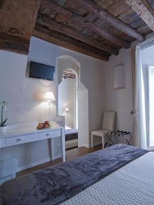 Postel nebo postele na pokoji v ubytování B&B Il Corso