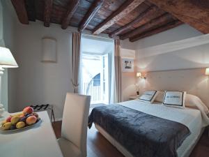 Postel nebo postele na pokoji v ubytování B&B Il Corso