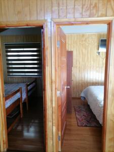 Poschodová posteľ alebo postele v izbe v ubytovaní Cabañas Mister Nelson