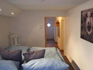 Postel nebo postele na pokoji v ubytování Ferienwohnung Gartenglück