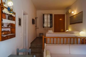 Postel nebo postele na pokoji v ubytování Coral Apartments