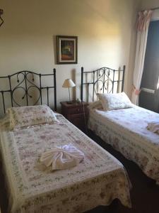 Un pat sau paturi într-o cameră la Posta Torreón