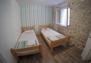 Voodi või voodid majutusasutuse Fiesta Siesta Social Hostel toas