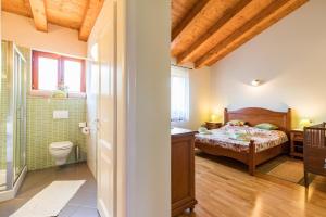 Postel nebo postele na pokoji v ubytování Villa Anita