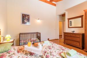 Postel nebo postele na pokoji v ubytování Villa Anita