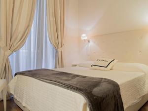 Postel nebo postele na pokoji v ubytování B&B Il Corso