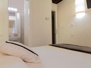 Postel nebo postele na pokoji v ubytování B&B Il Corso