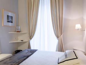 Postel nebo postele na pokoji v ubytování B&B Il Corso