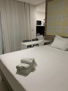 Ένα ή περισσότερα κρεβάτια σε δωμάτιο στο Villas do Pratagy CocoBambu