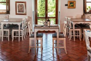 Un restaurante o sitio para comer en Relais Parco Fiorito & SPA - Agriturismo, Ristorante e Fattoria Didattica