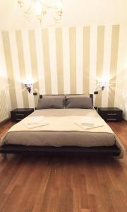 Säng eller sängar i ett rum på Appartamento La terrazza di Dora