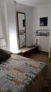 A bed or beds in a room at apartamento Canary Style 2 las canteras