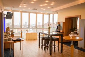 TV a/nebo společenská místnost v ubytování Ringhotel Drees