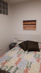 A bed or beds in a room at apartamento Canary Style 2 las canteras