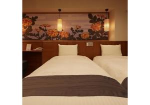 Lova arba lovos apgyvendinimo įstaigoje Sakura Sky Hotel - Vacation STAY 18449v